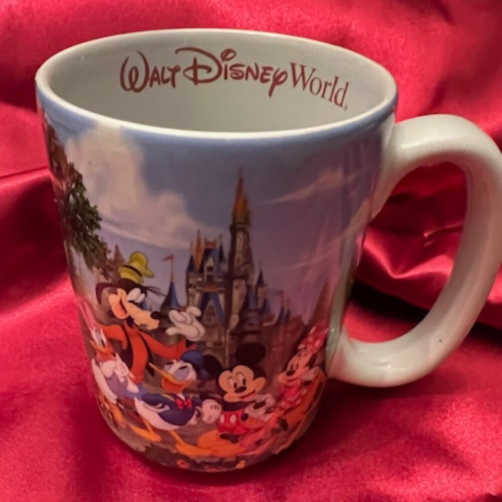 Walt Disney World ceramic mug featuring Mickey Mouse and friends "MOM" on handle